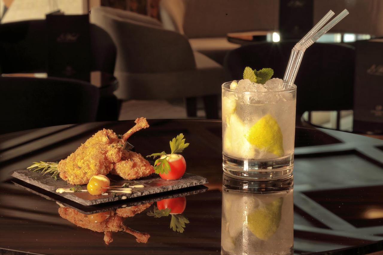 Le Palace D'Anfa Касабланка Экстерьер фото A caipirinha cocktail